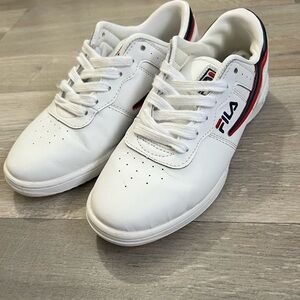 Fila woman’s White and Navy Sneakers size 6 US